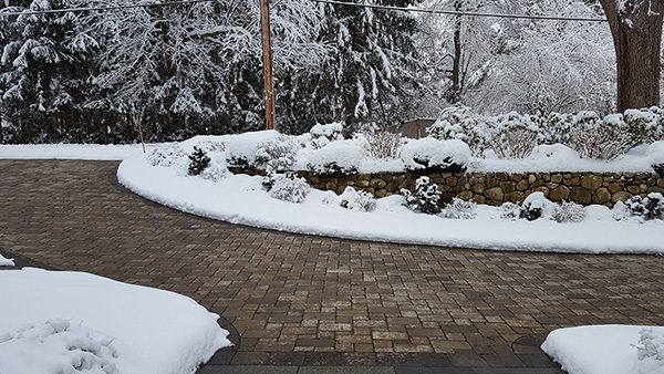 ClearZone snow melting system installed for heated paver driveway.